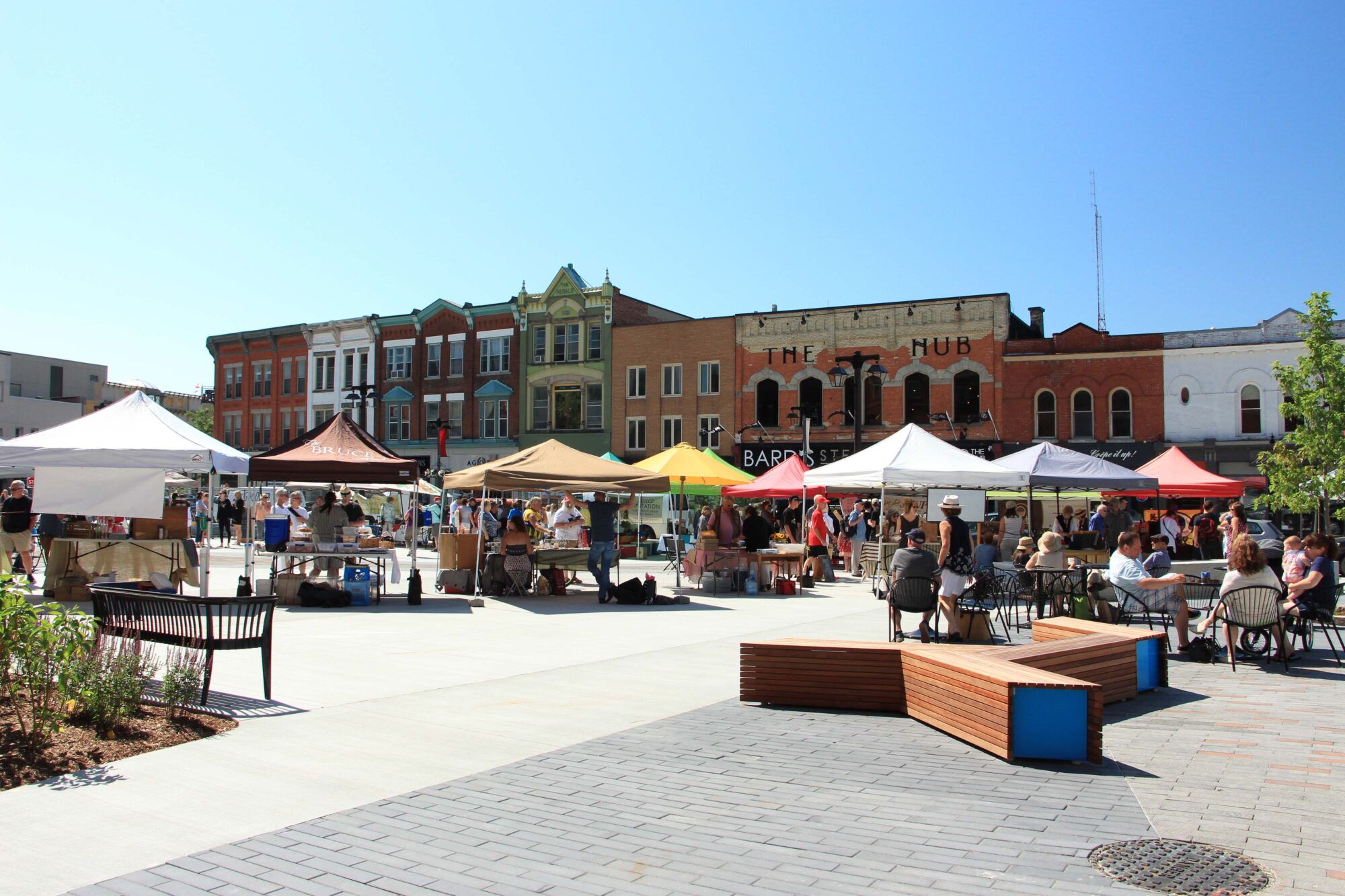 A group of vendors with tents up at Stratford Market Square